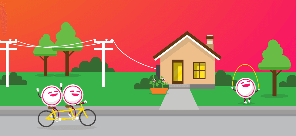Winky riding a tandem bicycle in front of a home connected to power lines. 
